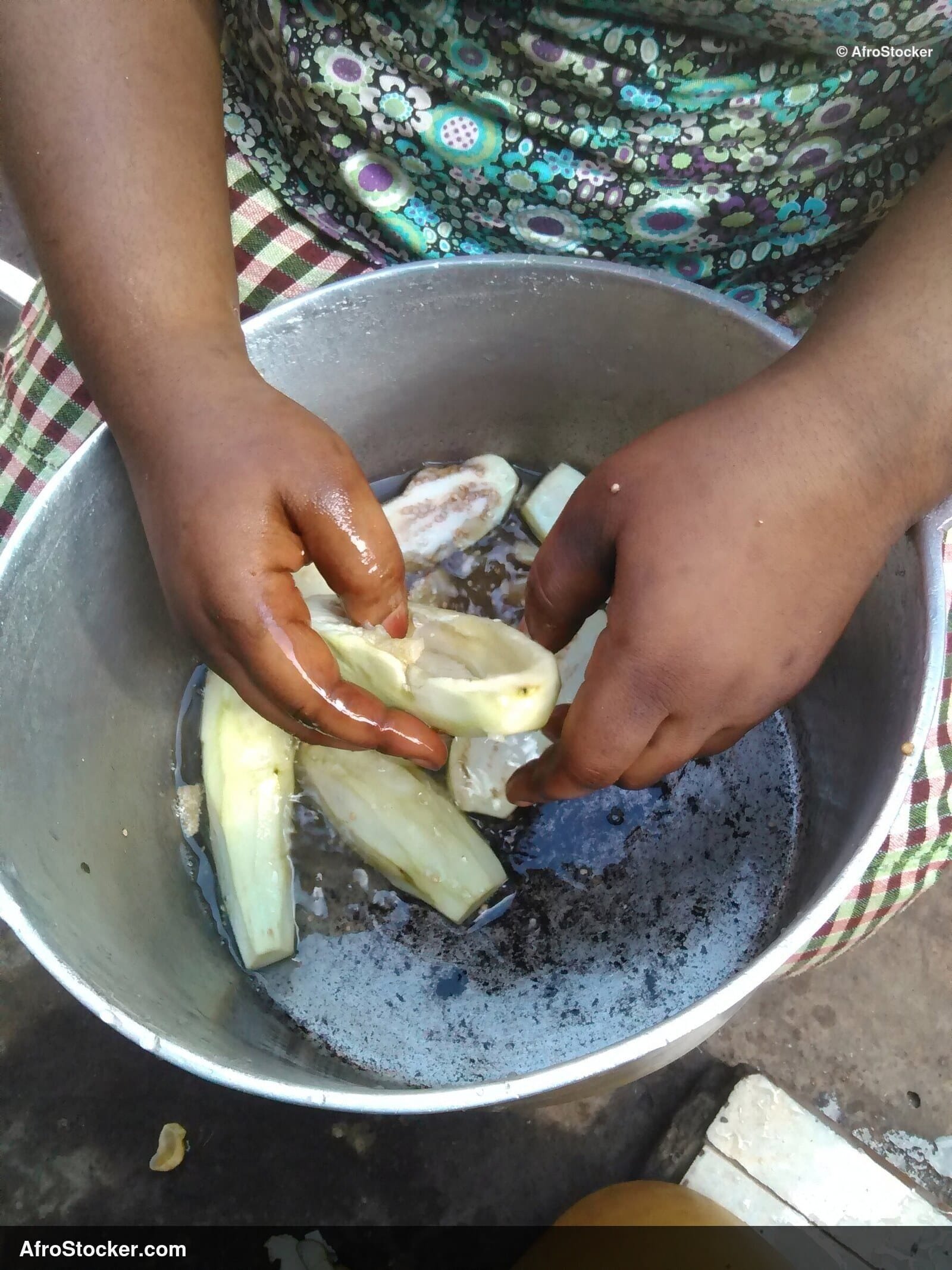 African Woman Cooking Traditional Meal - AfroStocker