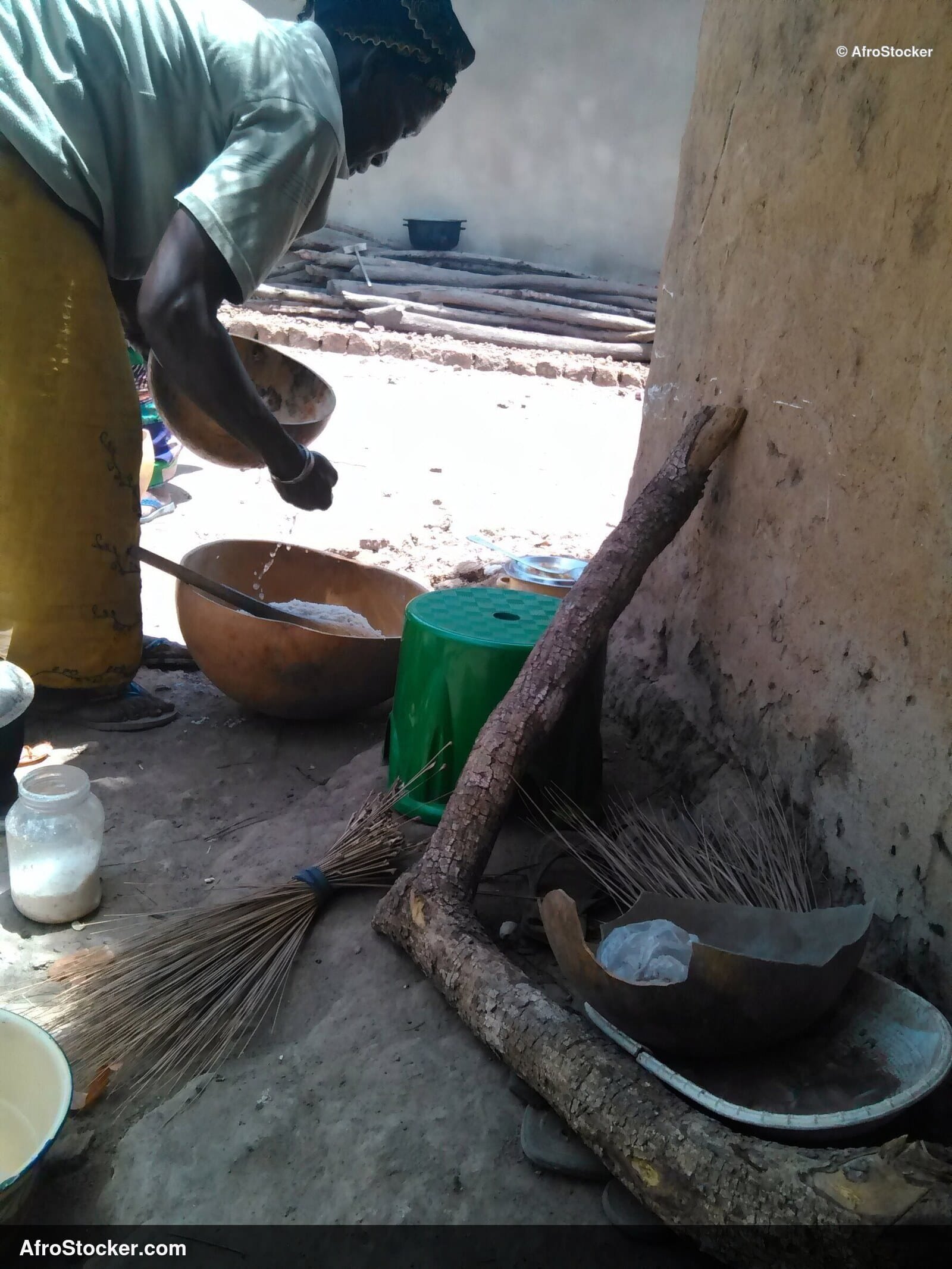 Woman Cooking in African Village - AfroStocker
