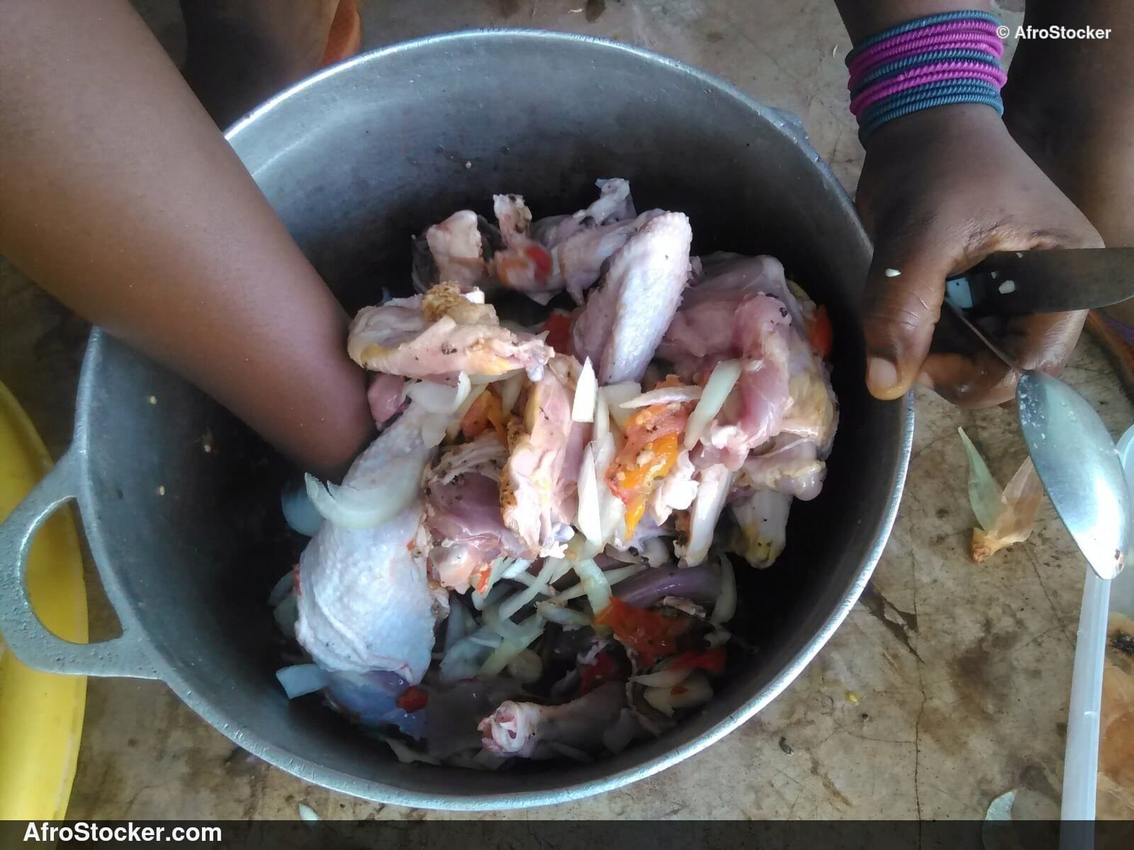 Woman Preparing Chicken Sauce, Africa - AfroStocker