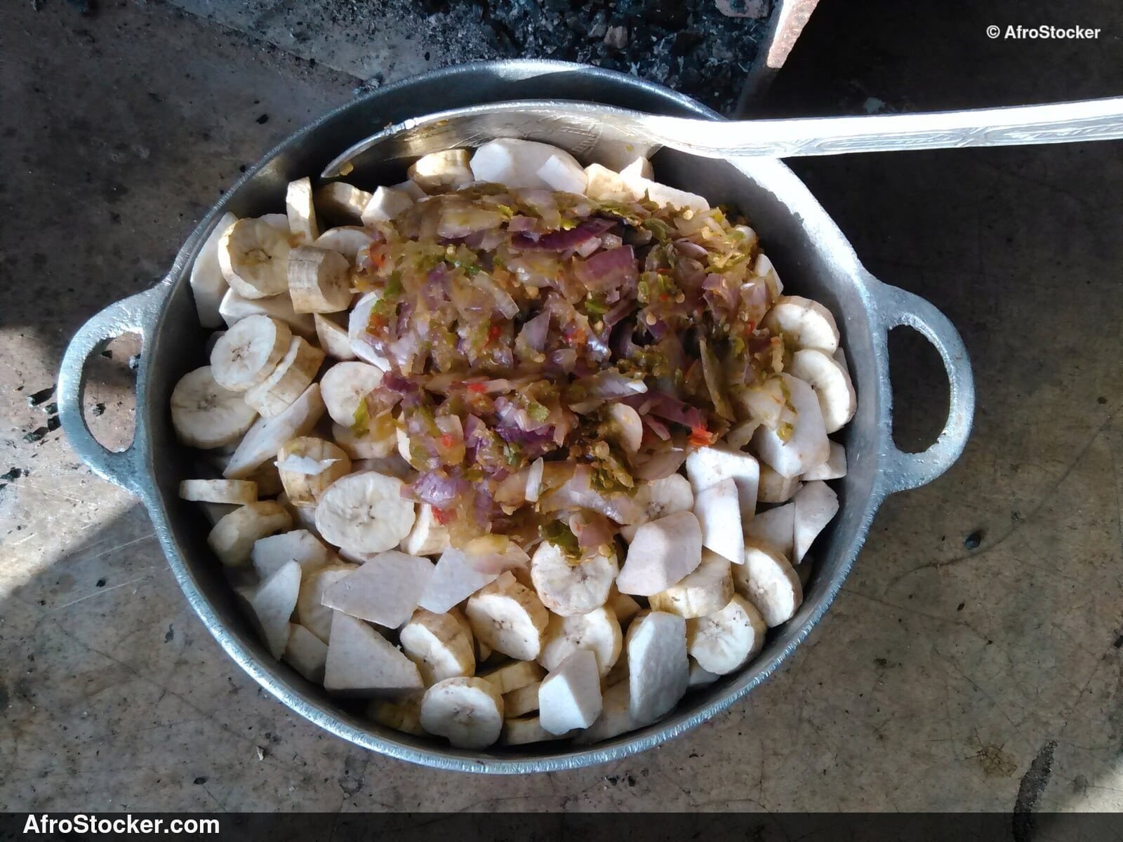 Sauce Being Prepared in African Pot - AfroStocker