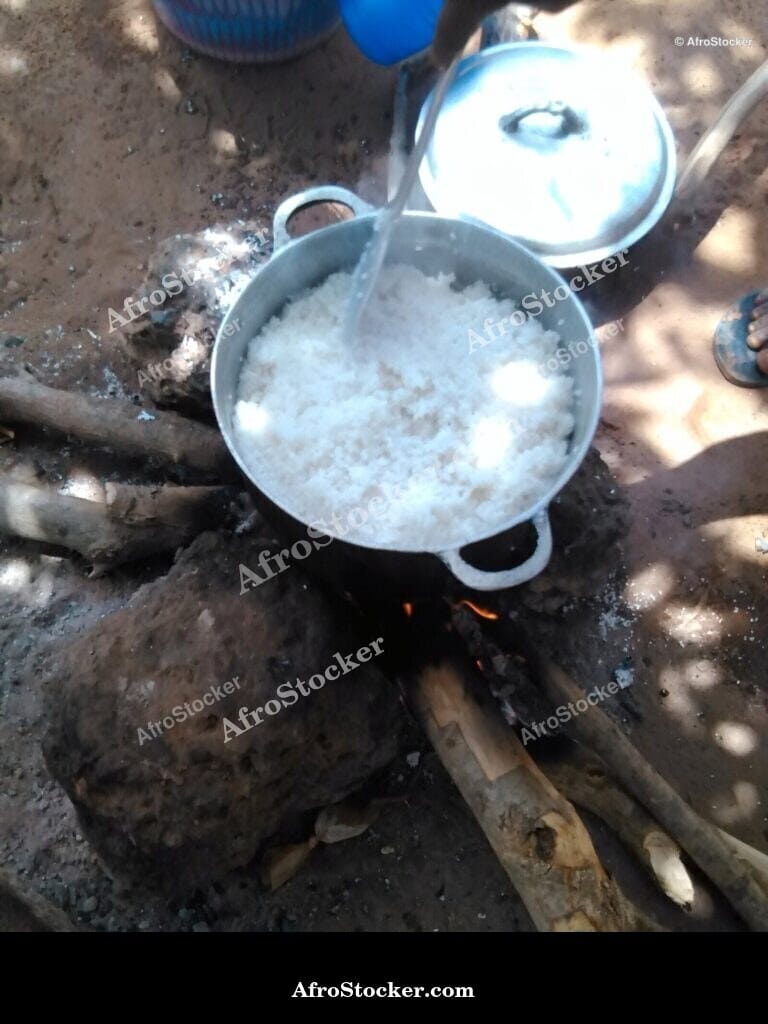 African Pots on Wood Fire - AfroStocker