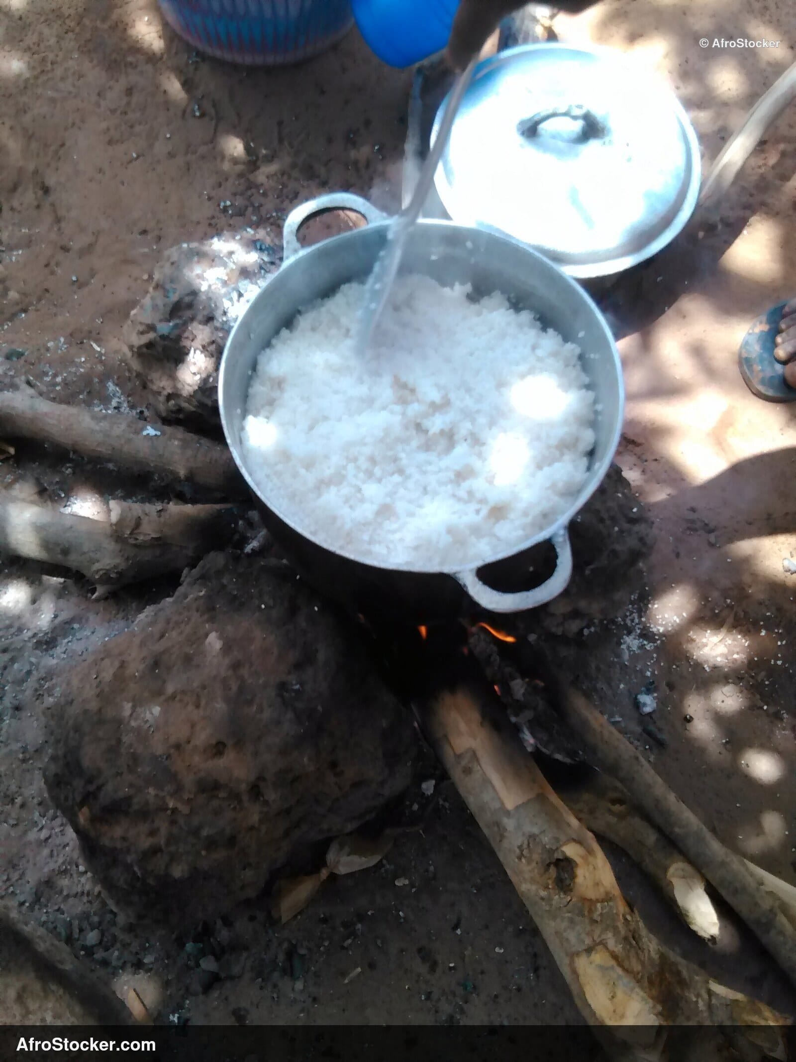 African Pots on Wood Fire - AfroStocker