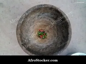 Chili Peppers in African Mortar