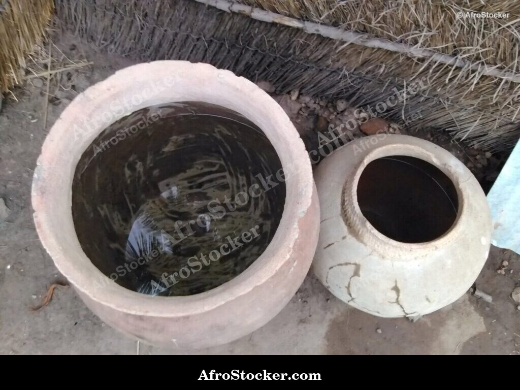 African Clay Pot Filled With Water | AfroStocker