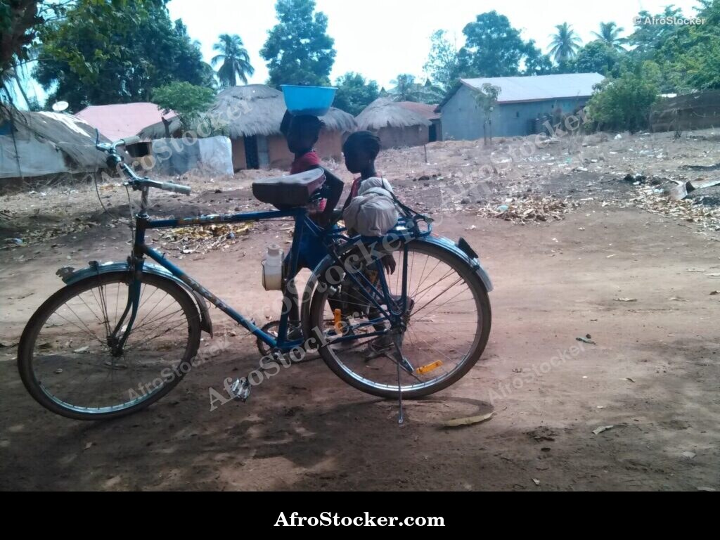 Girls With Bicycle African Village / Filles avec Vélo Village Africain | AfroStocker