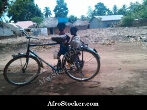 Girls With Bicycle African Village