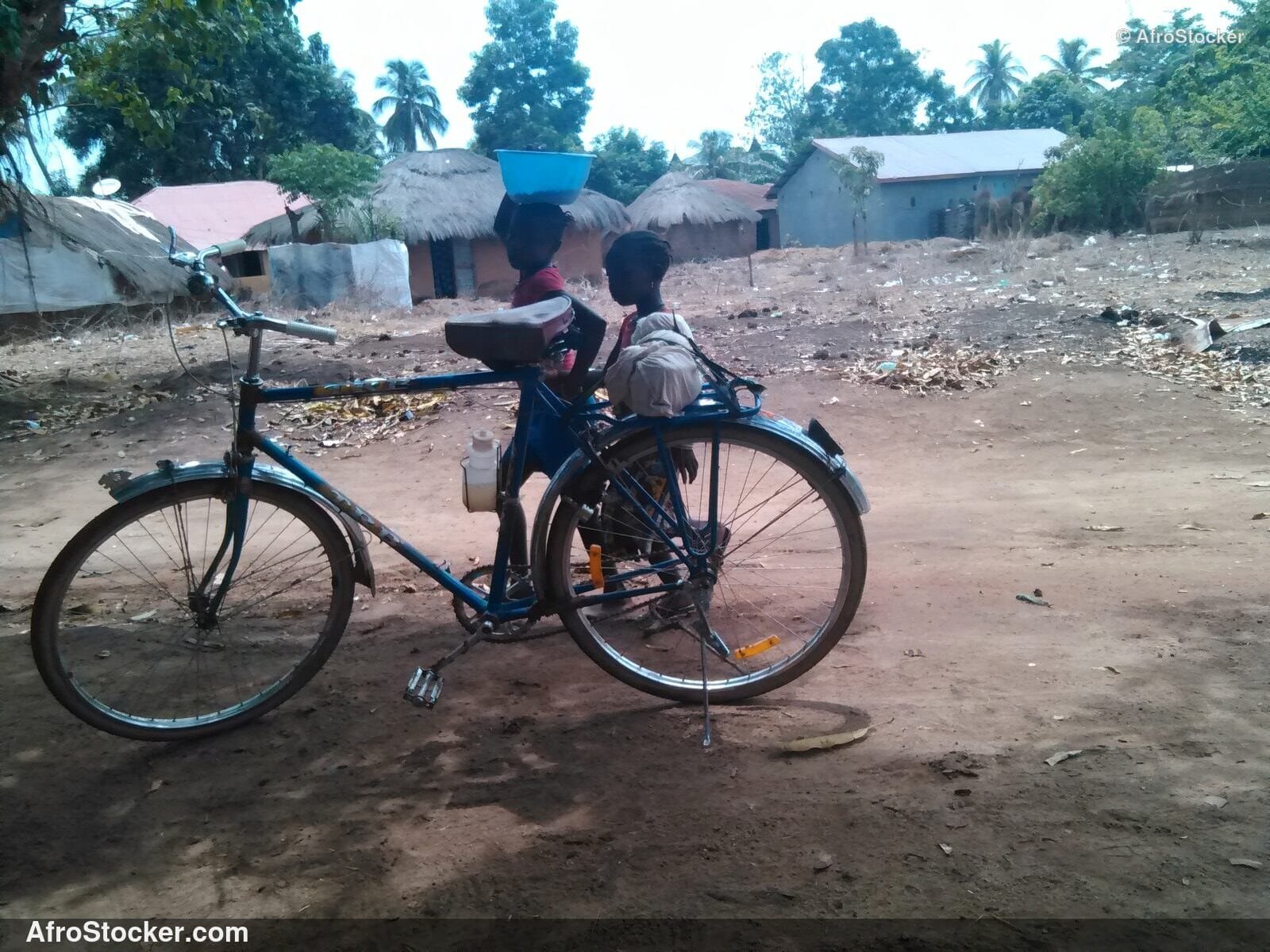 Girls With Bicycle African Village / Filles avec Vélo Village Africain | AfroStocker