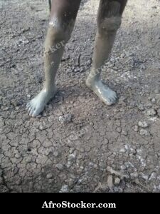 Foot In Mud African Village