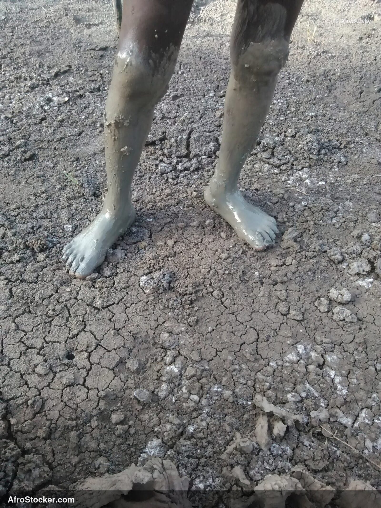 Foot In Mud African Village / Pied dans la Boue Village Africain | AfroStocker