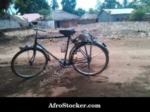 Bicycle African Village Scene
