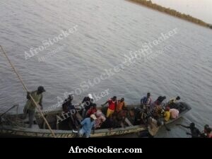 Village Canoe Passengers Africa