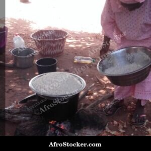 woman cooking african kitchen daily life