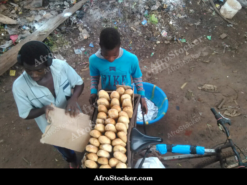 Bicycle Bread Vendor Africa / Vendeur de Pain à Vélo Afrique | AfroStocker