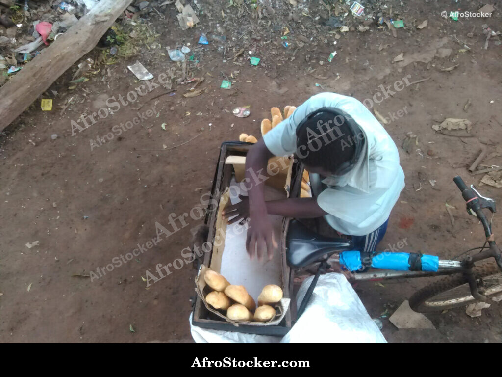 Street Bread Vendor Africa / Vendeur de Pain de Rue Afrique | AfroStocker