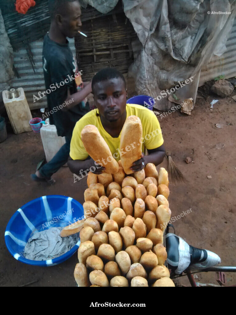 African Bread Vendor Market / Vendeur de Pain Marché Africain | AfroStocker